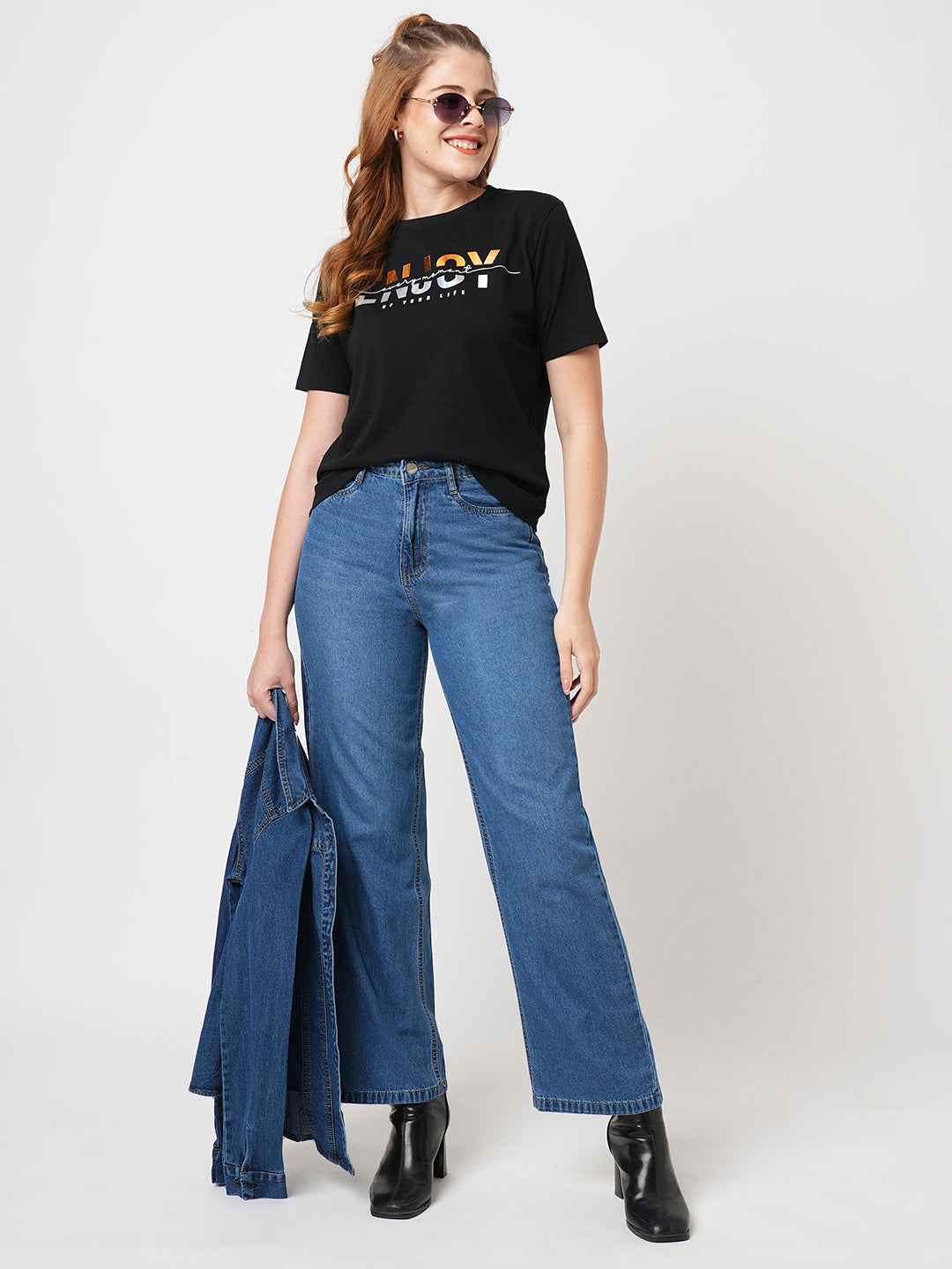 woman in wide leg jeans