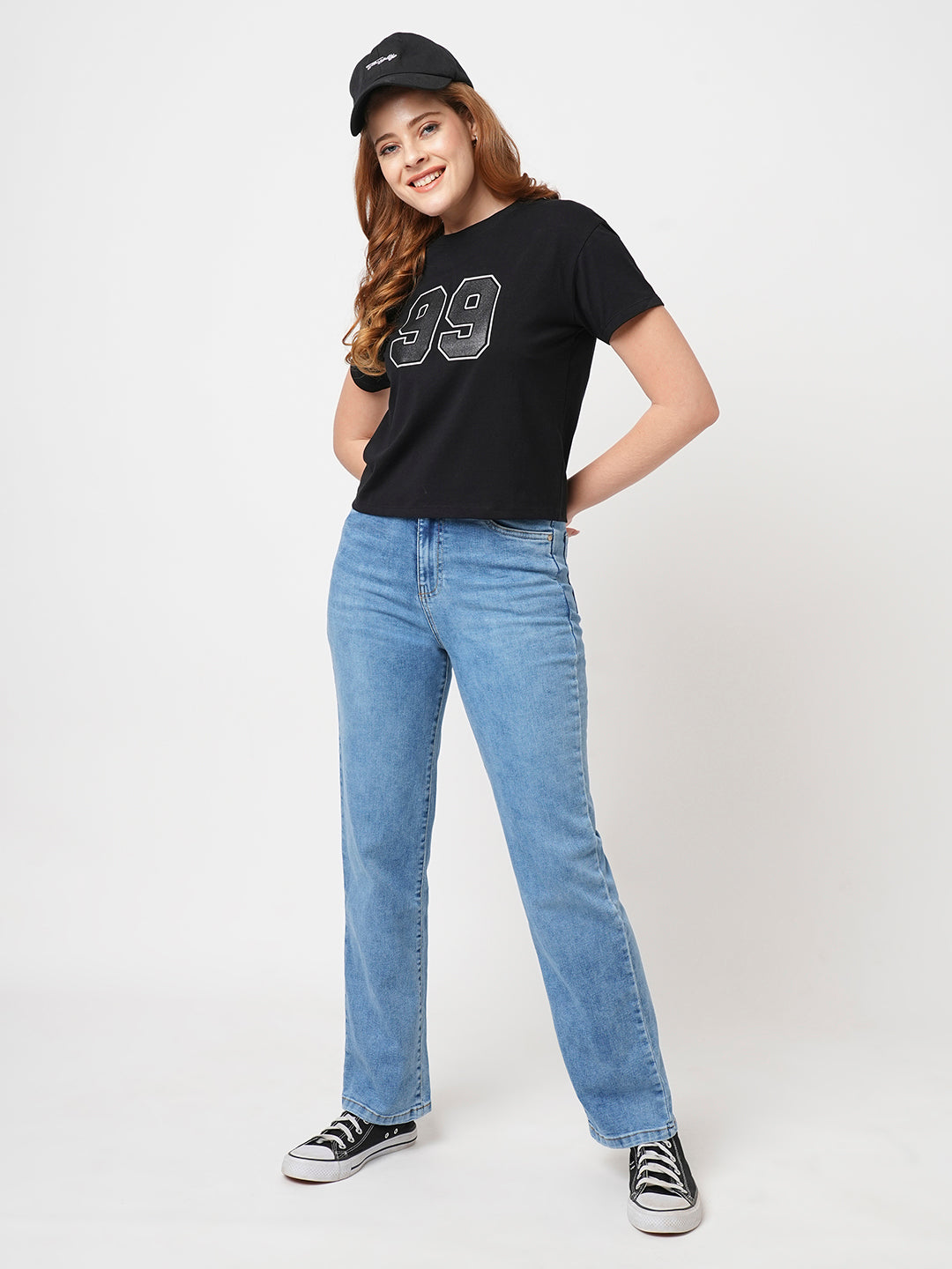 woman in straight fit jeans